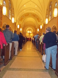 Cardinal Dolan incensing the altar