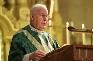 Monsignor Schmelzer giving a homily at a Traditional Latin Mass at Holy Redeemer