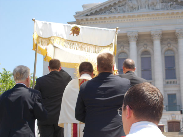 2012 Madison Corpus Christi Procession ascends the steps of the Capitol Building.