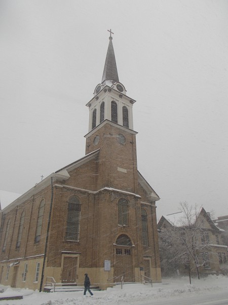 Holy Redeemer Church and rectory in snow