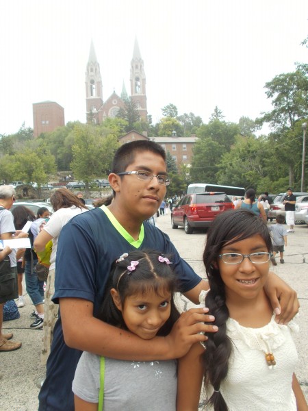 We've arrived! Jose, Leslie and Isabel with the amazing basilica church in the background.