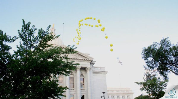 Balloon Rosary floats past the WI State Capitol. Photo by Tom Reitz, TomReitz.com
