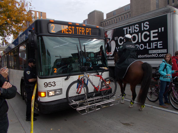 Police horse and bus.
