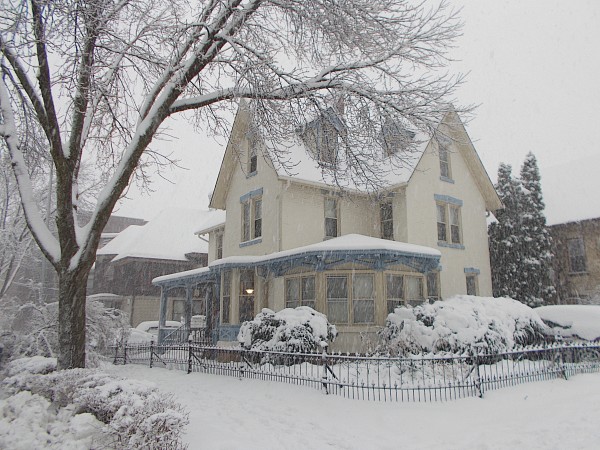 Pretty house at W Gilman and Henry Street in the snow