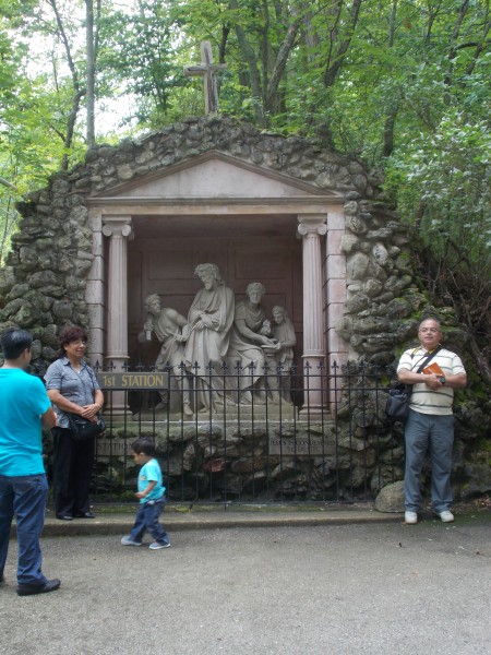 The whole group went first to pray the Stations of the Cross. The sculptures for the 14 stations showing the suffering and death of Jesus for our salvation are carved from limestone and placed on a path that winds up the hill. Here Padre Jose Luis (on the right) is about to begin leading the prayers.