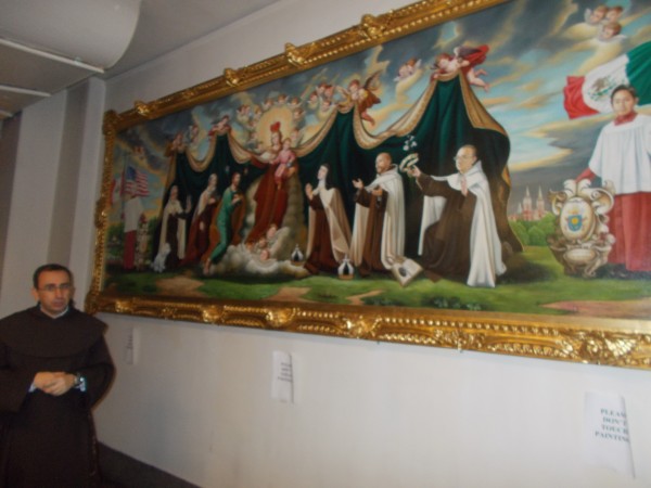Here is the other painting, just incredible. Both paintings show Our Lady's mantle spread over Saint Teresa, Saint John of the Cross and other Carmelites. She is their patroness. This painting is very recent, that's Pope Francis' crest to the left of the altar boy. And the artist included some Holy Hill Carmelites--the frist furthest to the right is Padre Celedonio himself, and over on the left is Father Jude the prior of the community! This delighted me.